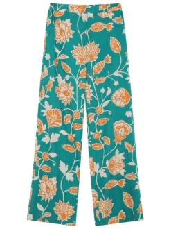 Pantalon chino vert avec des motifs floraux et une coupe flare