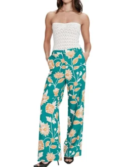 Pantalon chino vert avec des motifs floraux et une coupe flare