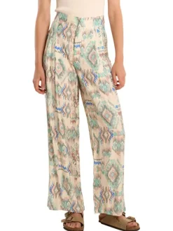 Pantalon écru pourvu de motifs aztec mulitcolores imprimés et d'une coupe large