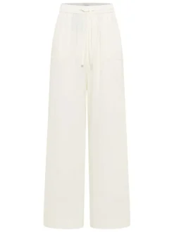 Pantalon écru uni avec une coupe fluide et une taille élastiquée