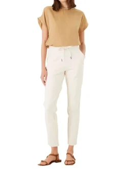 Pantalon écru uni avec une coupe slim et une taille intermédiaire