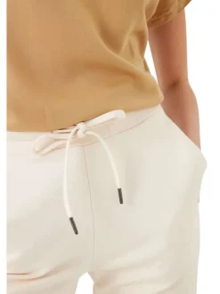 Pantalon écru uni avec une coupe slim et une taille intermédiaire