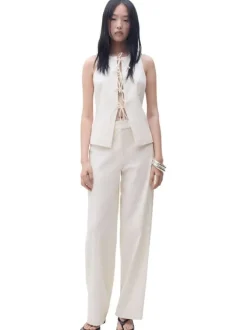 Pantalon écru uni à coupe droite fluide avec une taille mi-haute