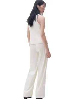 Pantalon écru uni à coupe droite fluide avec une taille mi-haute