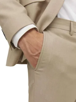 Pantalon de costume en laine mélangée beige avec une coupe slim fit