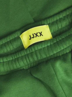 Pantalon de jogging en coton vert uni à coupe large et élastiqué aux chevilles