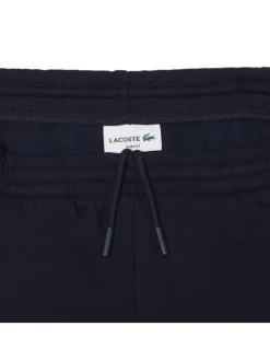 Pantalon de jogging marine en coton coupe slim avec logo brodé et liens de serrage à la taille