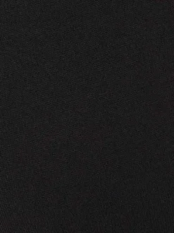 Pantalon de pyjama noir uni avec une coupe flare et une taille élastiquée