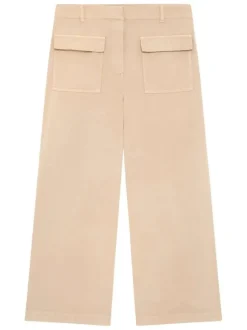 Pantalon en coton beige à coupe ample pourvu de poches à rabats