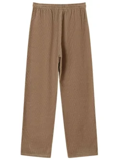 Pantalon en coton beige en velours côtelé avec une coupe droite