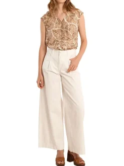 Pantalon en coton blanc uni pourvu d'une coupe baggy et d'une taille haute