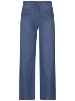 Pantalon en coton bleu denim uni pourvu de multiples poches plaquées