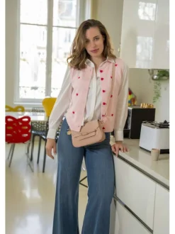 Pantalon en coton bleu denim uni pourvu de multiples poches plaquées