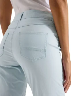 Pantalon en coton bleu uni avec une coupe slim et fermeture à boutons