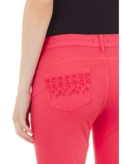 Pantalon en coton fuchsia avec une coupe slim et des poches en maille ajourée