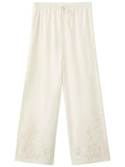 Pantalon en coton mélangé écru uni pourvu de détails brodés et ajourés
