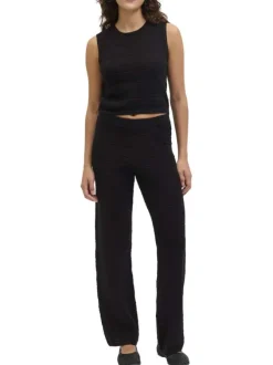 Pantalon en coton noir uni en maille ajourée pourvu d'un coupe droite