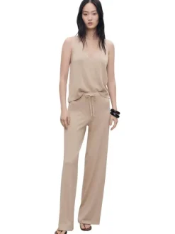 Pantalon jogging beige uni avec une coupe droite et un cordon de serrage