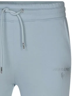 Pantalon jogging ciel uni avec une taille élastiquée et une coupe skinny