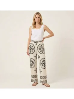 Pantalon jogging écru à motifs pourvu d'une taille intermédiaire