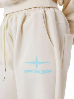 Pantalon jogging écru uni avec une coupe droite et un logo imprimé