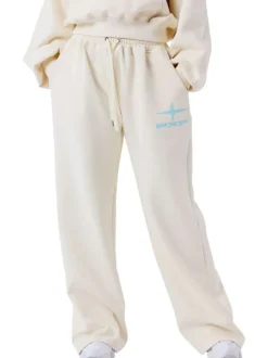 Pantalon jogging écru uni avec une coupe droite et un logo imprimé