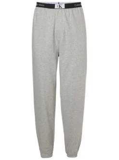 Pantalon Jogging en coton gris uni avec une coupe slim et poches latérales