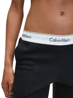 Pantalon Jogging en coton noir uni coupe slim avec des poches latérales