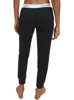 Pantalon Jogging en coton noir uni coupe slim avec des poches latérales