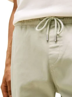 Pantalon jogging en coton tilleul uni avec une coupe slim et un lien
