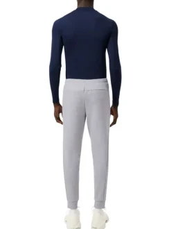 Pantalon jogging gris clair uni coupe slim avec logo de la marque brodé