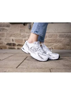 Pantalon jogging Jess bleu à rayures avec une coupe bootcut et 4 poches