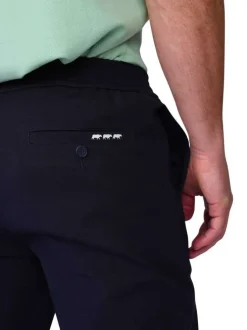 Pantalon jogging marine uni avec une coupe droite à zip et à bouton