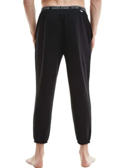 Pantalon Jogging noir uni avec une coupe slim et des poches latérales