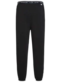 Pantalon Jogging noir uni avec une coupe slim et des poches latérales
