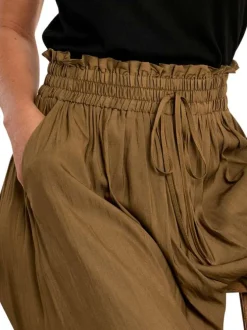 Pantalon kaki uni pourvu d'une coupe extra large et d'une taille élastiquée