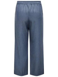 Pantalon large bleu indigo uni à coupe fluide avec une taille haute élastiquée
