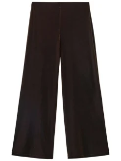 Pantalon marron en velours satiné fluide pourvu d'une coupe ample