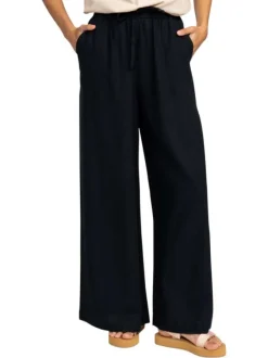 Pantalon noir à coupe ample pourvu de poches plaquées sur les côtés