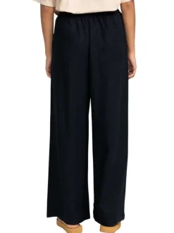 Pantalon noir à coupe ample pourvu de poches plaquées sur les côtés