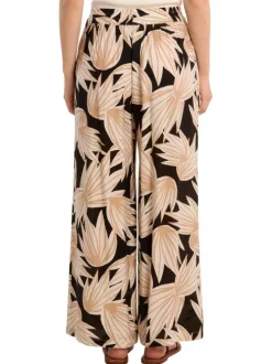 Pantalon noir à motifs pourvu d'une coupe large et d'une taille haute