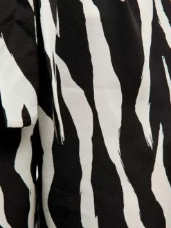Pantalon noir orné d'un motif animalier et pourvu d'une taille élastiquée