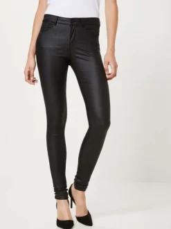 Pantalon noir satiné avec une coupe skinny à fermeture zippée boutonnée