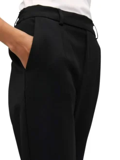 Pantalon noir uni avec une coupe droite et une taille élastiquée
