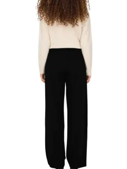 Pantalon noir uni avec une coupe flare et une fermeture à zip et agrafe