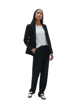 Pantalon noir uni avec une coupe slim et une taille intermédiaire