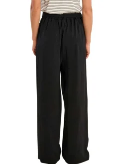 Pantalon noir uni pourvu d'une taille haute et d'une coupe large