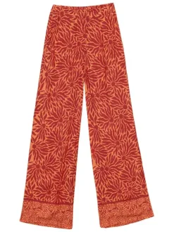 Pantalon orange à motifs pourvu d'une coupe large et d'une taille haute