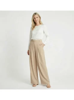 Pantalon Paline beige uni pourvu d'une coupe large et d'une taille haute