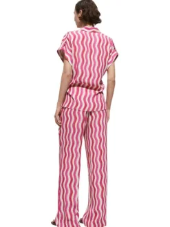 Pantalon rose avec une ceinture élastiquée une coupe wideleg et imprimé vagues